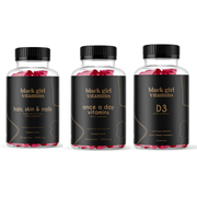 Three Black Girl Vitamins bottles: Hair, Skin & Nails; Once a Day Vitamins; D3 dietary supplements with flavors and quantities.