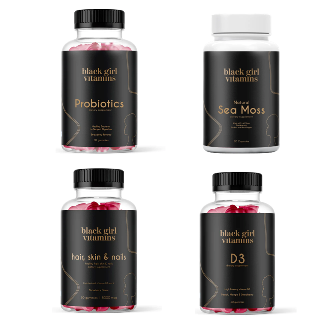 Four Black Girl Vitamins bottles: Probiotics gummies, Natural Sea Moss capsules, Hair Skin & Nails gummies, and D3 gummies.